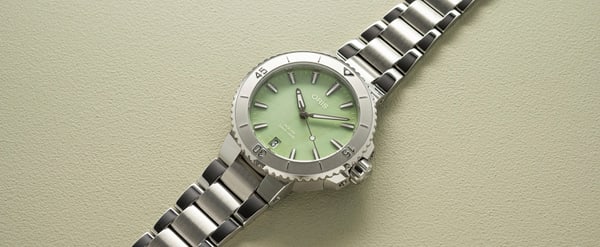 Aquis Date - 01 733 7770 4157-07 8 18 05P | Oris